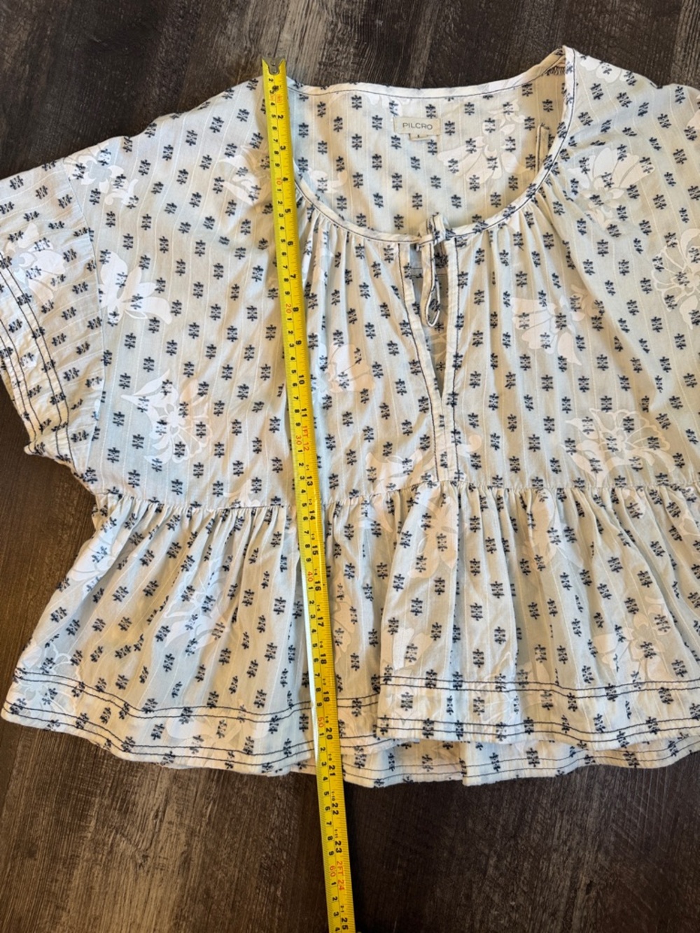 Lightweight White Peplum Top with Blue Floral Print - Picture 8 of 9